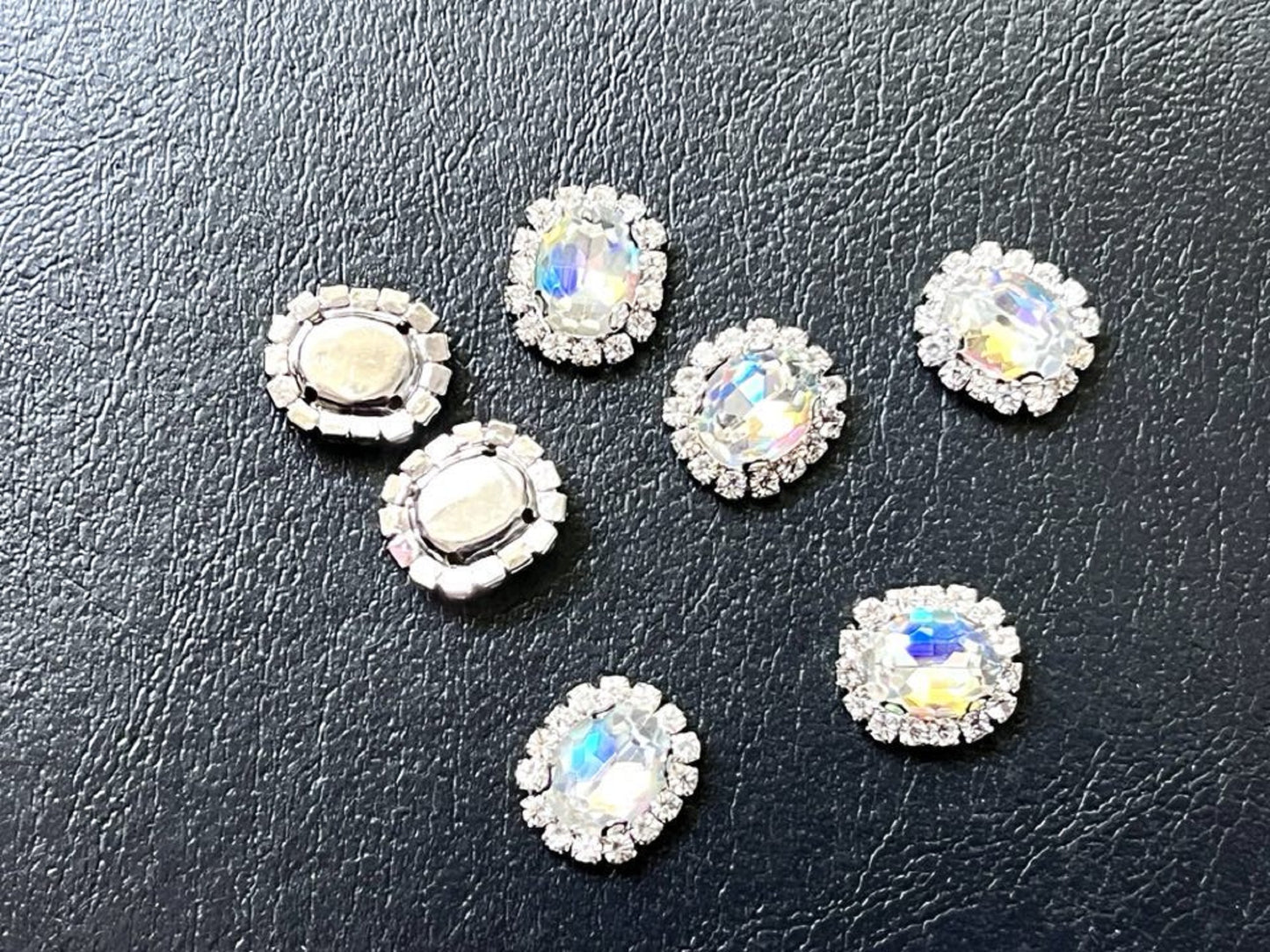 S12S (Laser) 10 Pcs / 12 x 14mm / Silver Base Sew On Oval Crystals