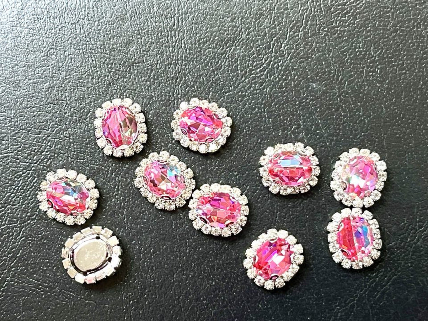 S12S (Laser) 10 Pcs / 12 x 14mm / Silver Base Sew On Oval Crystals