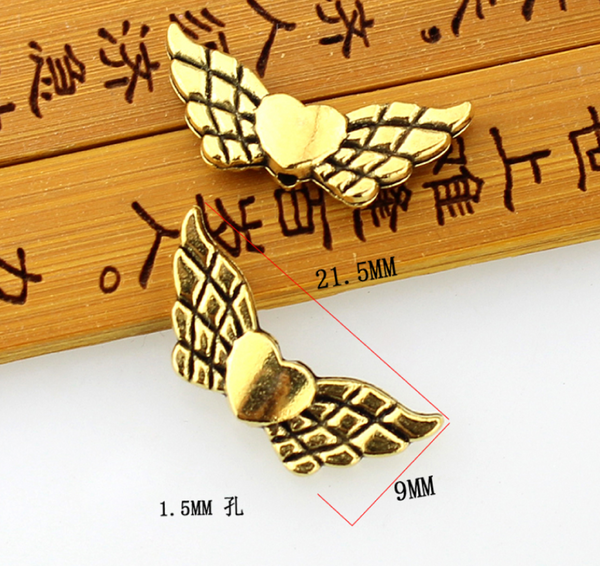 100 Pcs / Tibetan Angel Wing Spacer   F009