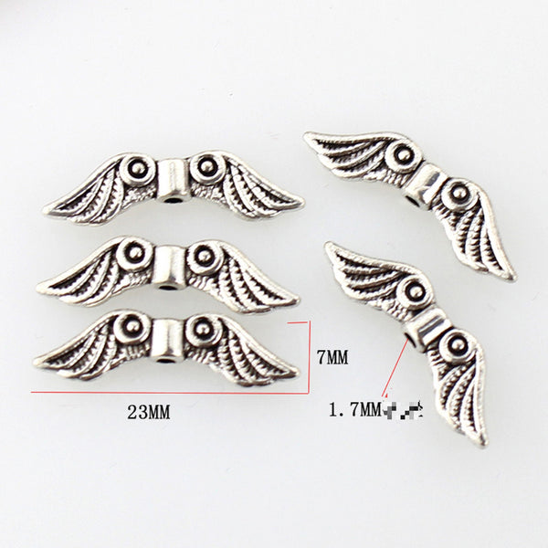 100 Pcs / Tibetan Angel Wing Spacer   F009