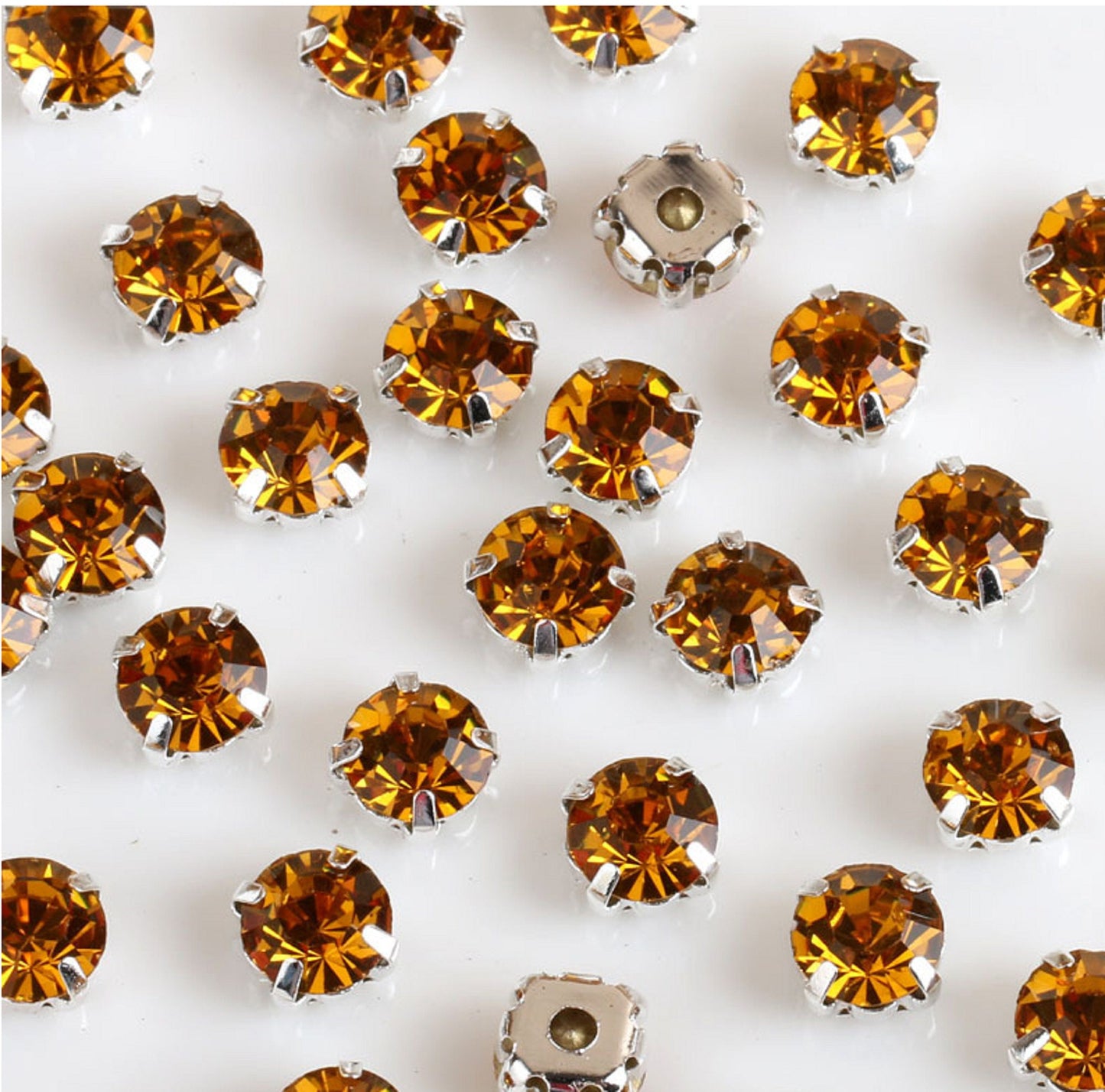 (S31S)  100 Pcs / 4mm / Sew On Silver Colour Base Rhinestones